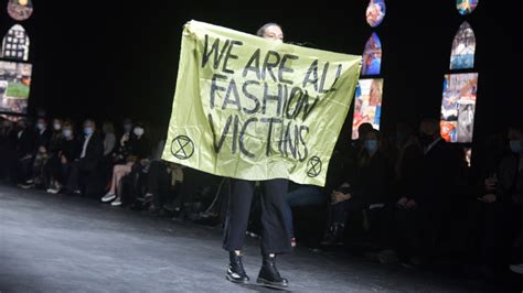 Protester Crashes Dior's Spring 2021 Paris Fashion 